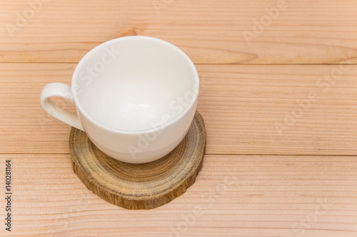 coffee cup on the wood plate