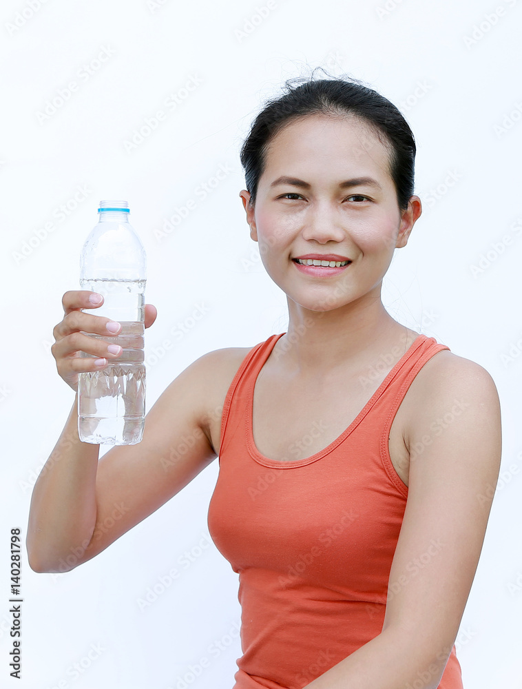 Healthy Woman Drinking Water after Workout, Fitness Girl in Workout Concept on white background. Healthy Woman Drinking Water after Workout, Fitness Girl in Workout Concept on white background.