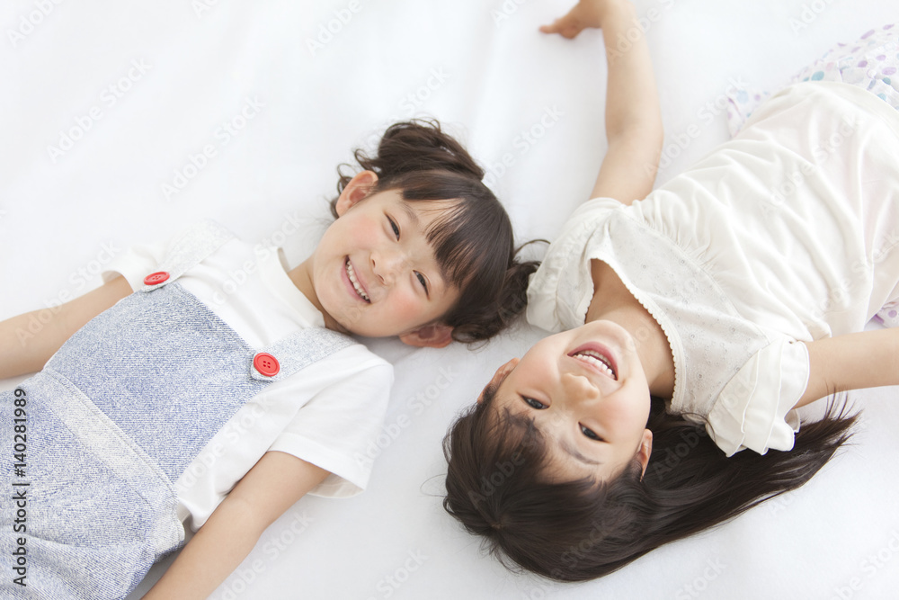 Girls laying down Girls laying down