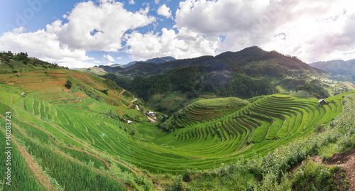 Blurred rice terrace and mountain landscape background with sky on cloudy day.