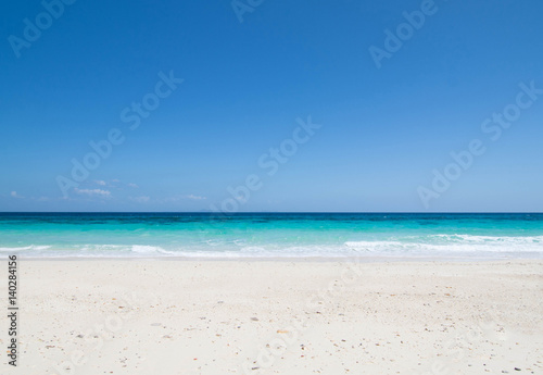 white beach and blue sea on clear sky day ,Phuket in Thailand © mungkornz
