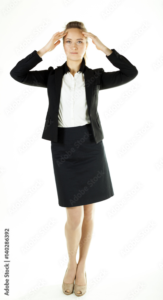 Smiling business woman in office clothes holds hands at head. White background
Smiling business woman in office clothes holds hands at head. White background