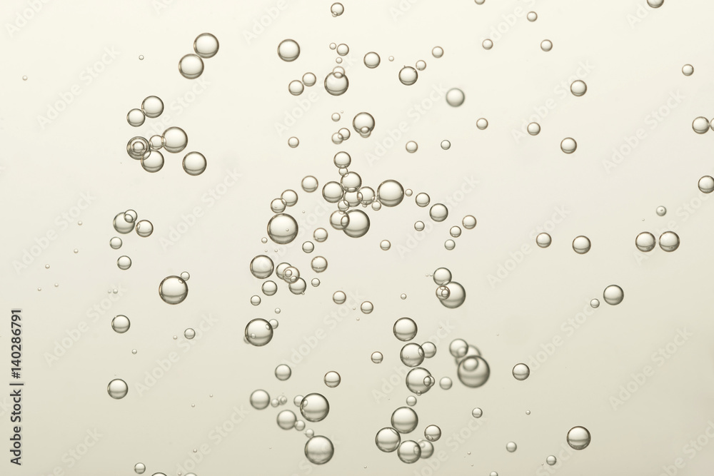 Beautiful air buibbles, flows over a light grey background Beautiful air buibbles, flows over a light grey background
