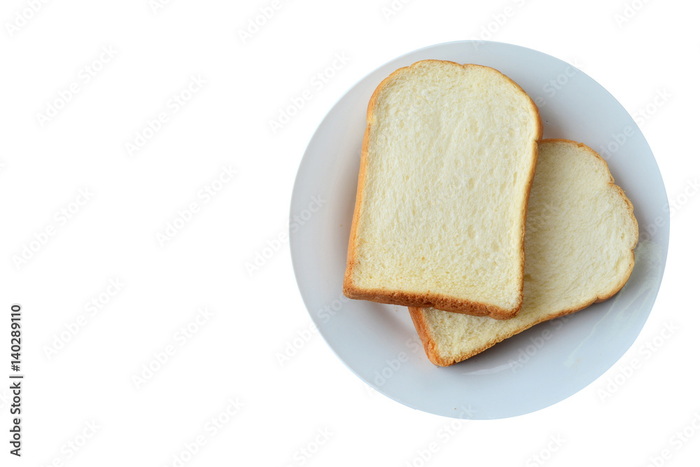 Slice of toast bread (selective focus) on plate isolated on white