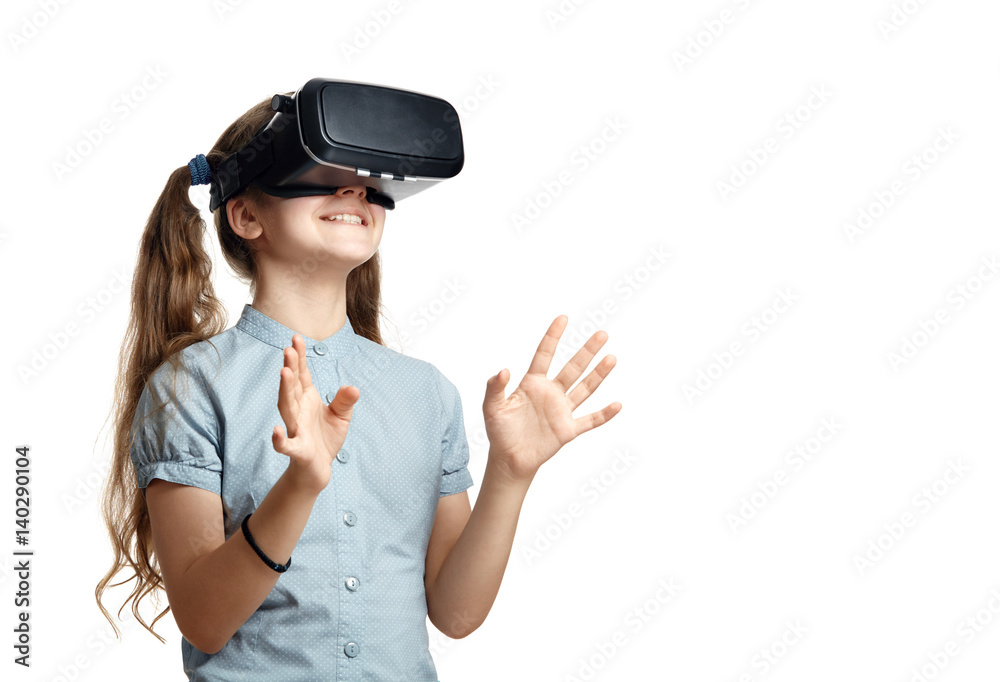 Young girl with virtual reality glasses isolated on white background. Young girl with virtual reality glasses isolated on white background.