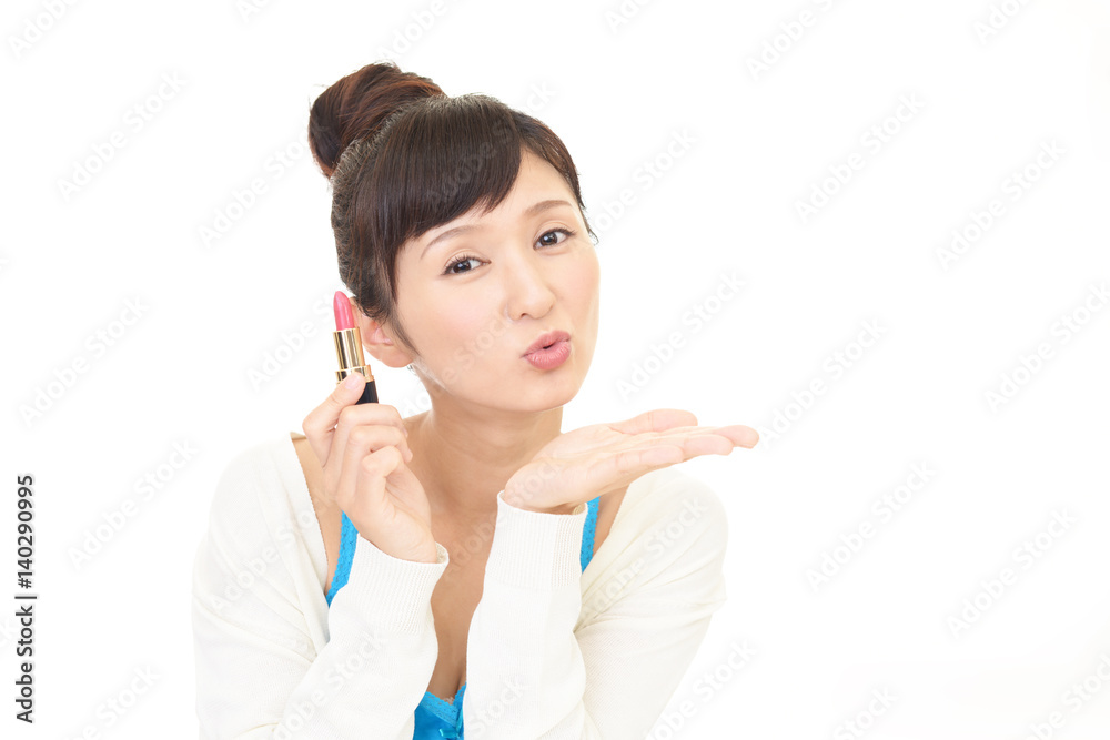 メイクアップをする女性 メイクアップをする女性