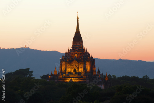 The peak of the ancient Buddhist temple of Gawdaw Palin at sunset. Bagan, Myanmar