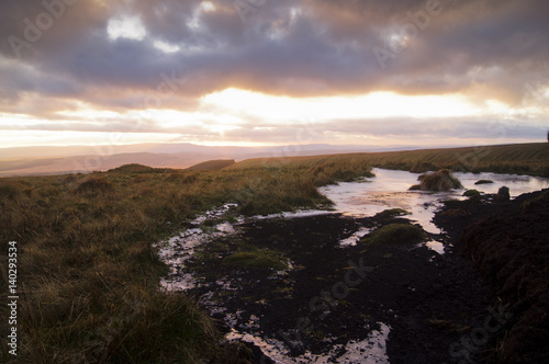 A winter sunset over a frozen bog in the Brecon Beacons © Ross