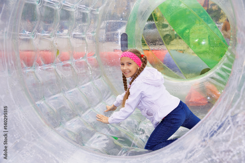 Girl moves inside the zorb