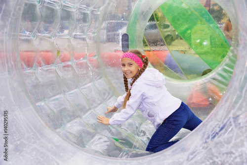Girl moves inside the zorb