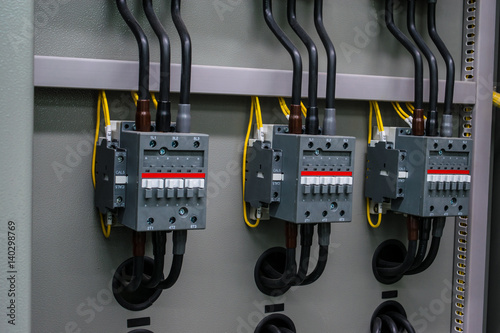Close up circuit breakers and wire in control panel