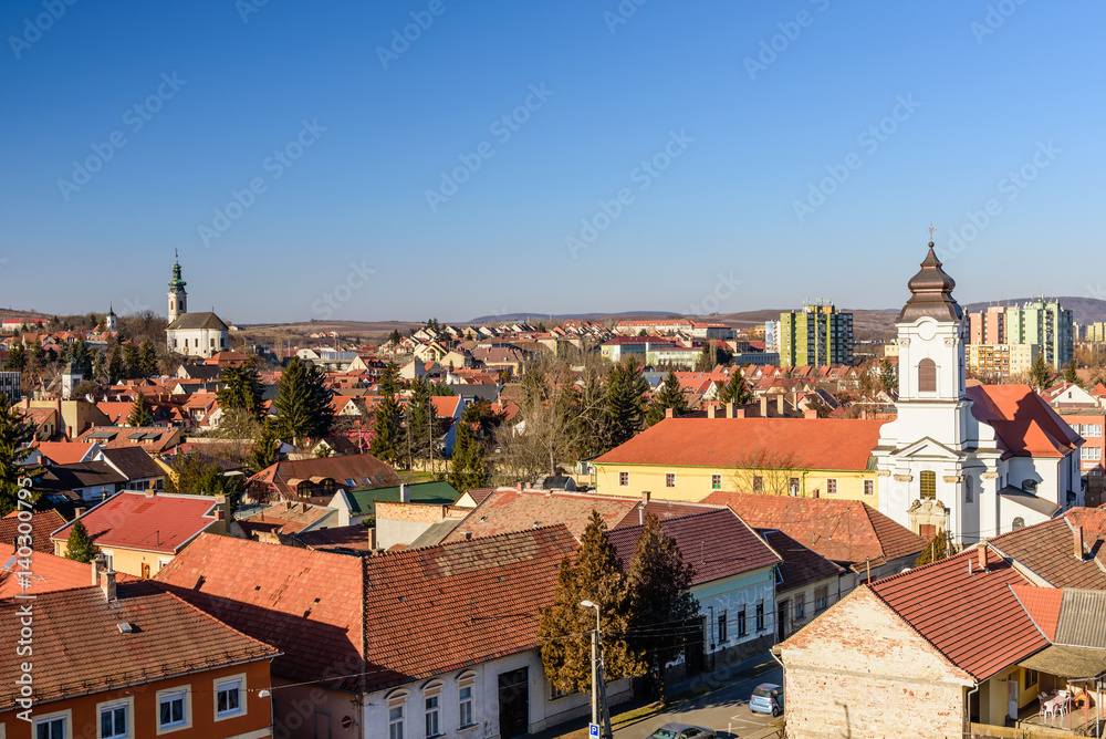 Fototapeta premium Aerial view of Eger with red tile roofs on a sunny day, Eger, Hungary
