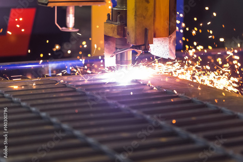 Machine for cutting steel. Industrial laser. Installation of plasma cut steel.