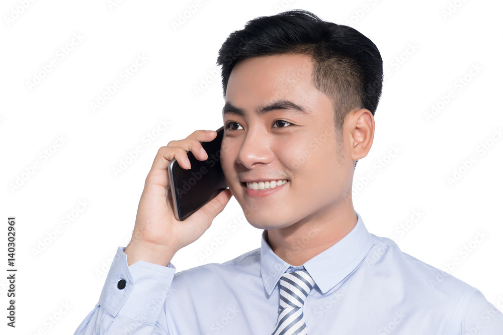 Smiling asian business man making phone Smiling asian business man making phone