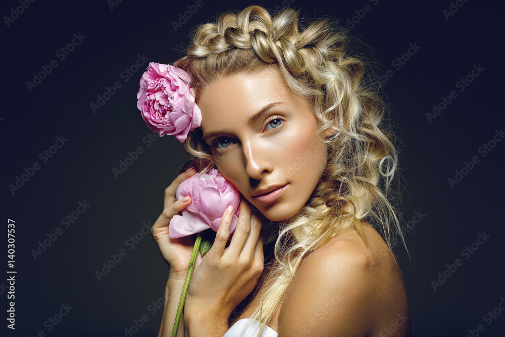 Naklejka premium Beautiful girl with peony flower