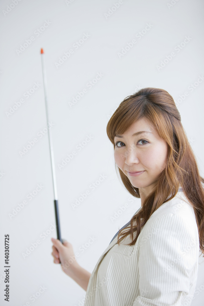 Businesswoman with Stick