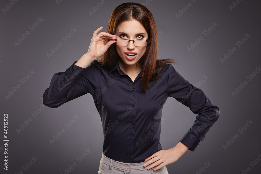 successful business woman. Isolated over grey background successful business woman. Isolated over grey background