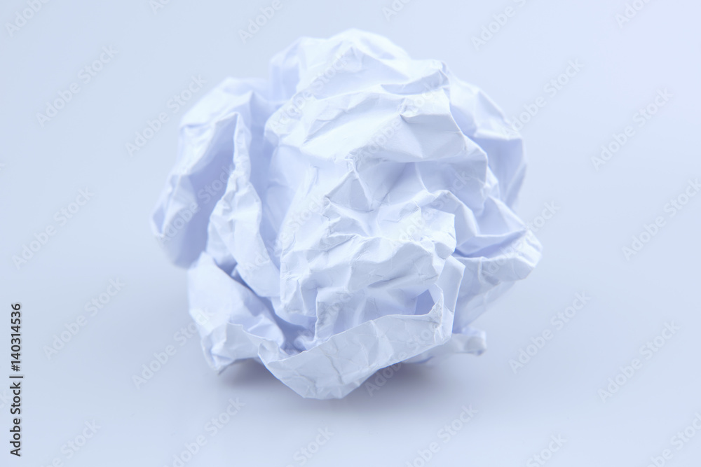 Crumpled paper on white. Paper is wrinkled