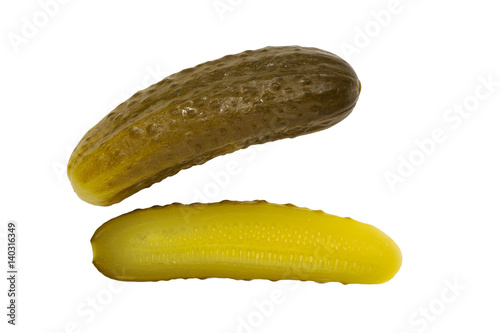 Half of pickled cucumber on white isolated background