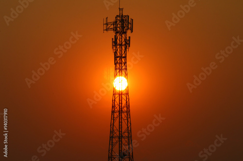 Mobile phone transmitter in the evening, the sun is down, and inside the transmission tower.