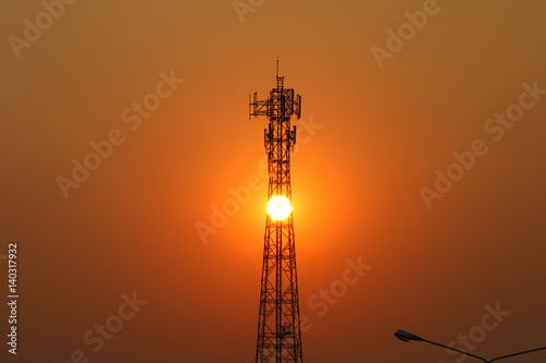 Mobile phone transmitter in the evening, the sun is down, and inside the transmission tower.