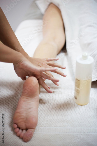 Woman receiving a foot massage at the health spa