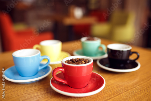 red cup of Grain coffee on table in cafe. Coffee concept  