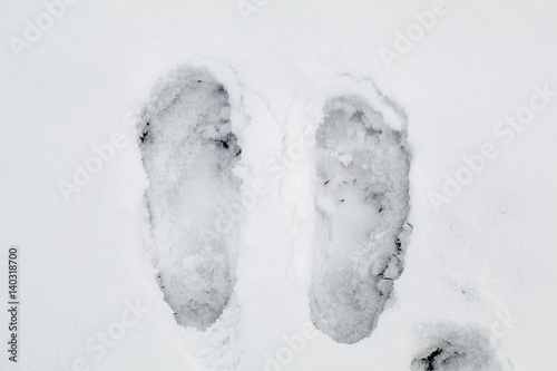 Footprint in the Snow. Barefoot in winter.