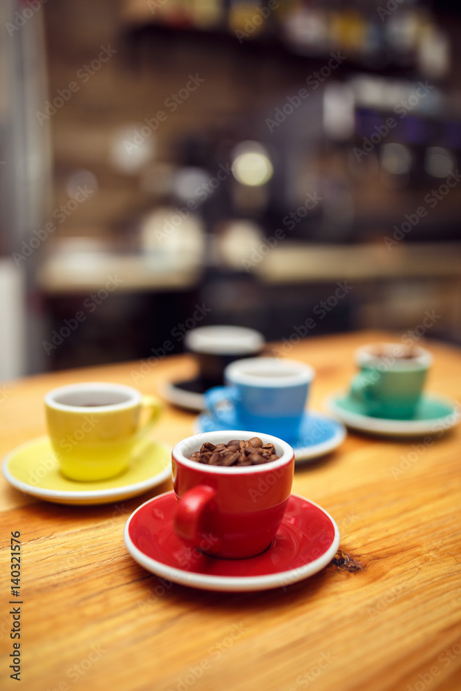 red cup of Grain coffee on table in cafe. Coffee concept
red cup of Grain coffee on table in cafe. Coffee concept