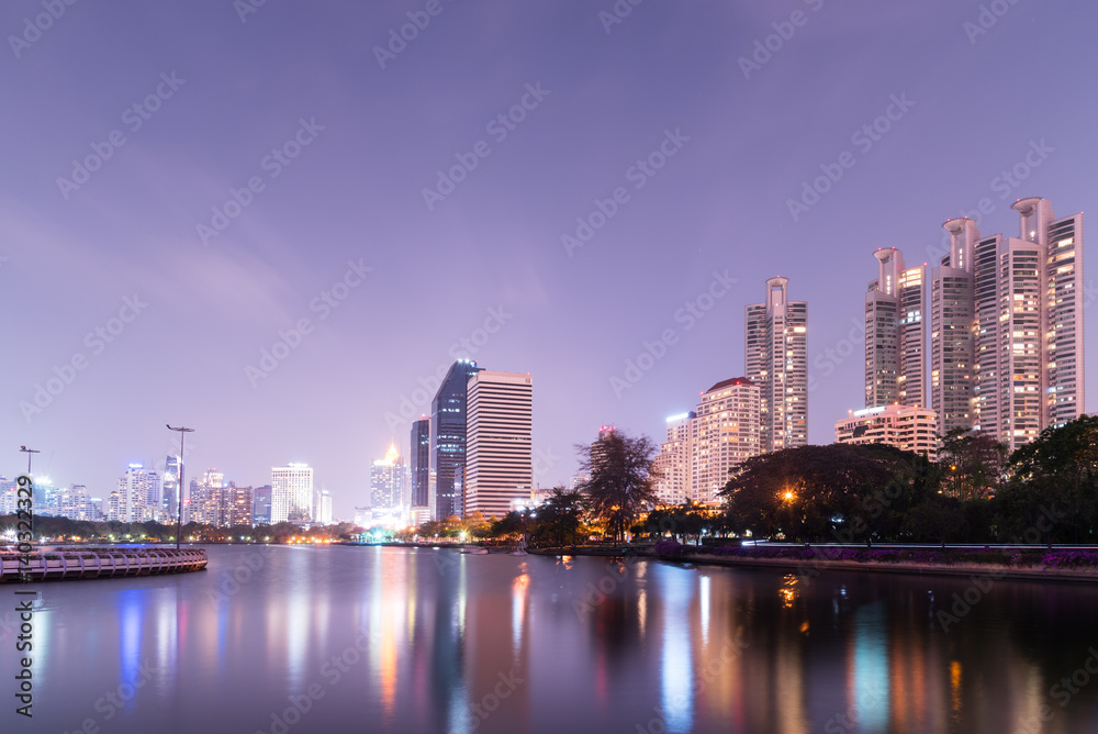 Bangkok city downtown at night with reflection of skyline, Bangkok,Thailand