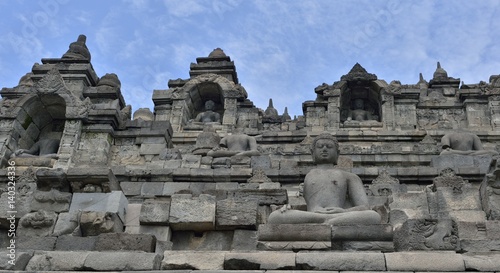 Borobudur Buddist Temple in island Java Indonesia. Detail of Buddhist carved relief in Borobudur temple in Yogyakarta, Java, Indonesia..