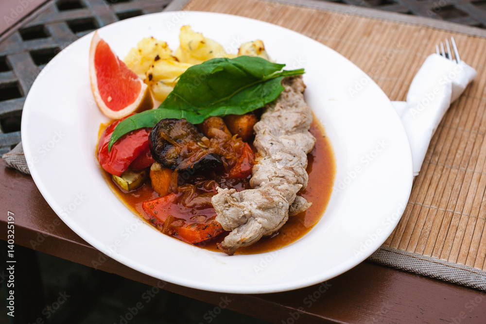 plate with grilled vegetables, meat and greens plate with grilled vegetables, meat and greens
