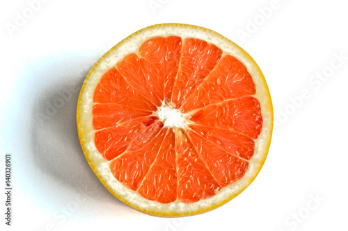 Grapefruit half on a white background