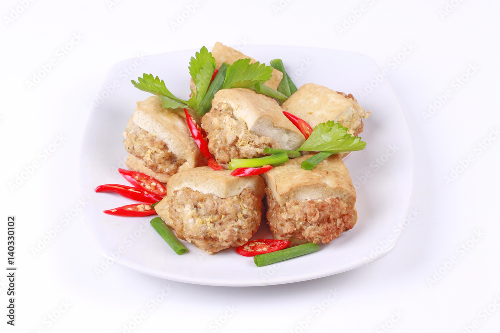 Fried gold bar as spicy fried tofu wrap minced pork . Fried gold bar as spicy fried tofu wrap minced pork .
