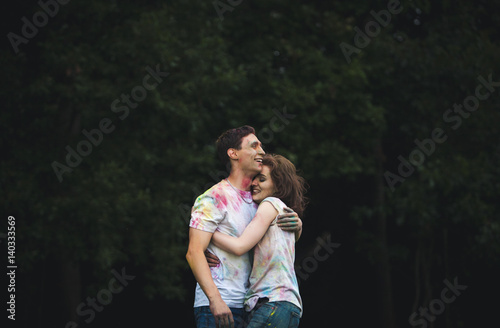 laughing in the park on holi color festival © jozzeppe777