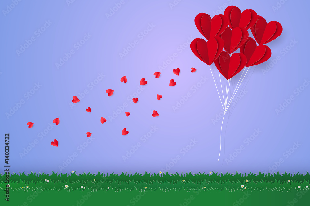 Red heart balloons flying over grass, paper art style