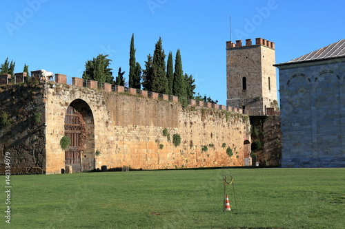 View to city walls, erected in 1156 by Consul Cocco Griffi. Pisa, Italy. Tower Torre di Santa Maria.