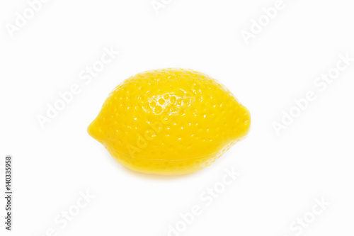 lemon. Children's toy a plastic on a white background.