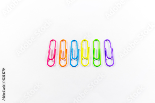 Office paper clips isolated on white background