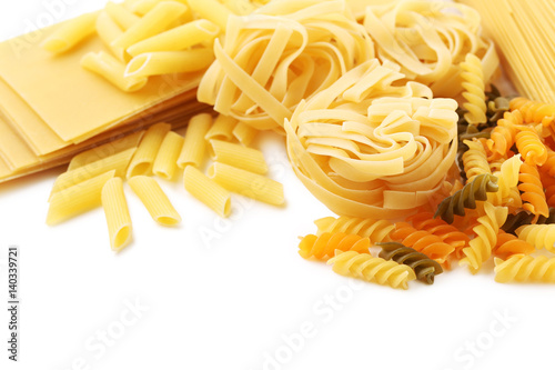 Different kinds of pasta on a white background