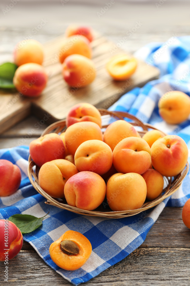 Ripe apricots fruit on grey wooden table Ripe apricots fruit on grey wooden table