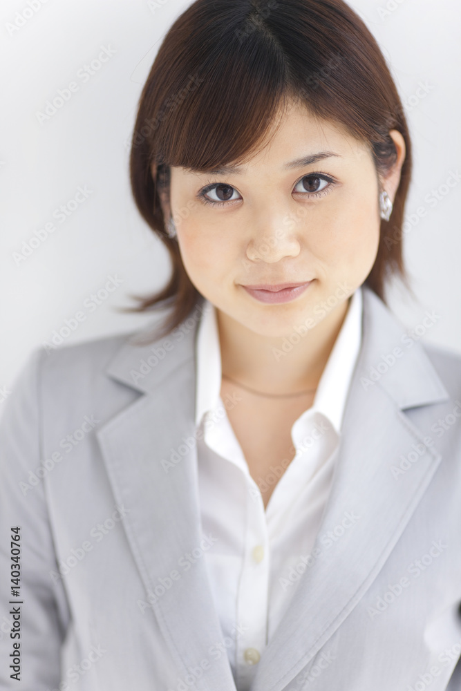 Portrait of young businesswoman, white background Portrait of young businesswoman, white background