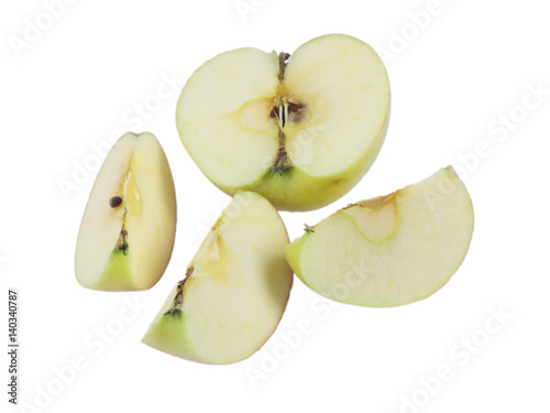 Apple pieces on white background