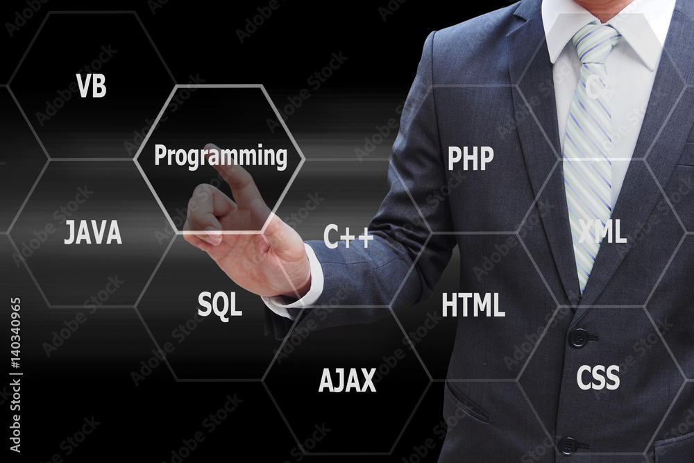 Programmer hand touching virtual panel of programming languages ...