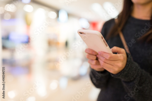 Woman working on cellphone