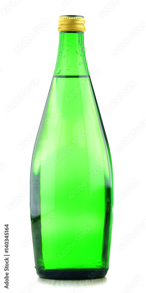 Glass bottle of mineral water isolated on white Glass bottle of mineral water isolated on white