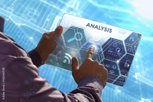 Business, Technology, Internet and network concept . Young business man working on the tablet of the future , select the virtual screen: Analysis