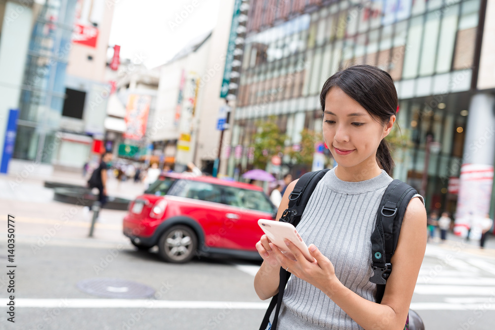 Woman use of cellphone in Fukuoka city Woman use of cellphone in Fukuoka city