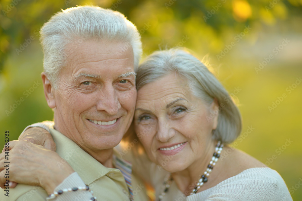 Happy elderly couple embracing Happy elderly couple embracing