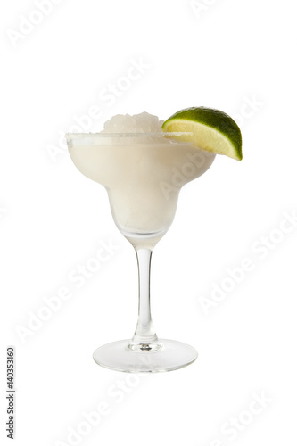 Classic margarita cocktail with lime slice and salty rim. Isolated on white background with clipping path